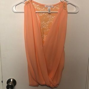 Sleeveless blouse with open back